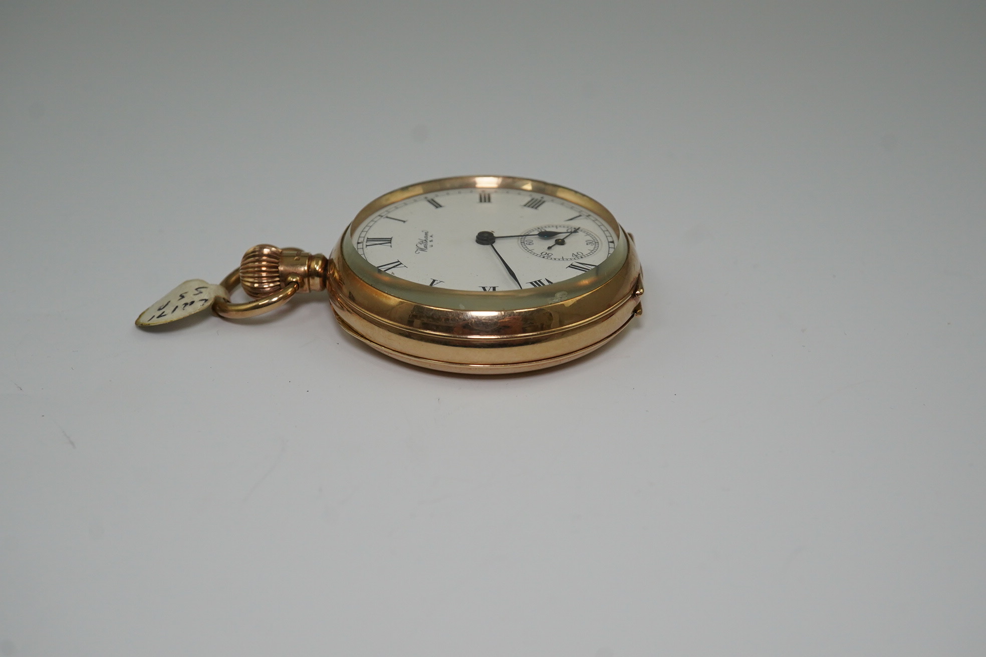 A George V 9ct gold Waltham open faced keyless pocket watch